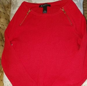 Red sweater with zippers